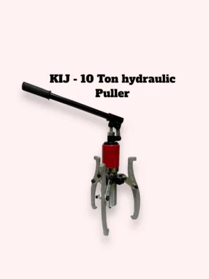 A close-up view of a hydraulic puller showcasing various components and connections in a mechanical setup. standing on three legs